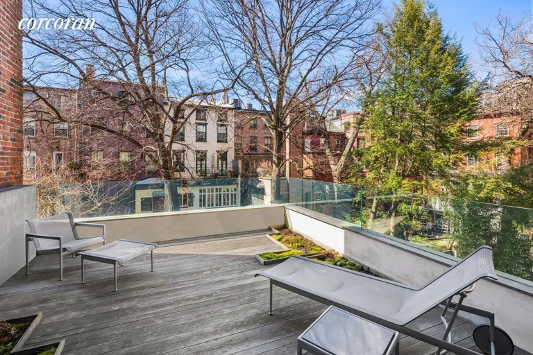 New York City Real Estate | View 16 Sidney Place | West facing terrace with garden views | View 8