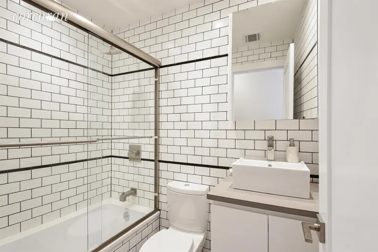 New York City Real Estate | View 18-93 Cornelia Street, 3R | Fully Tiled Bathroom with Deep Soaking Tub | View 4
