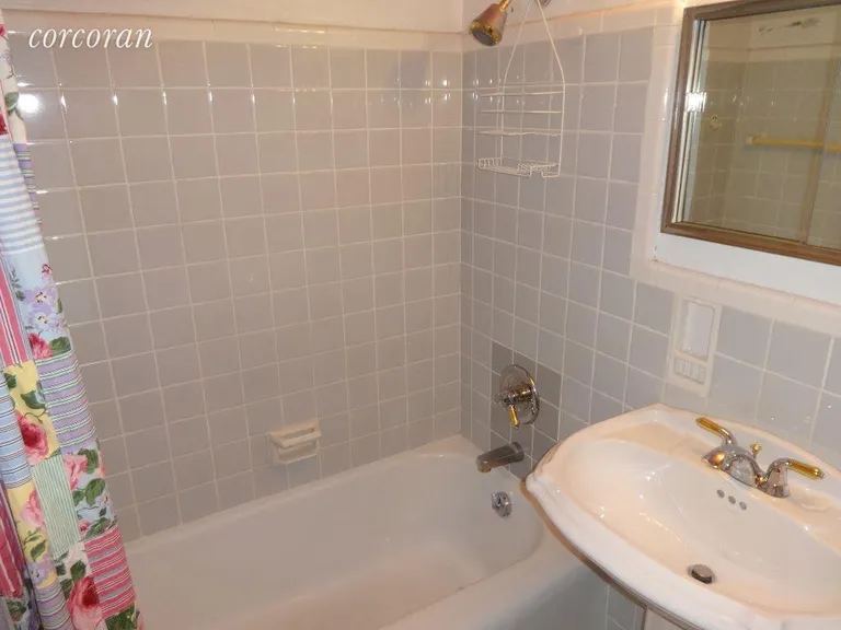 New York City Real Estate | View 122 Ashland Place, 5E | Tiles Bath with Tub | View 10