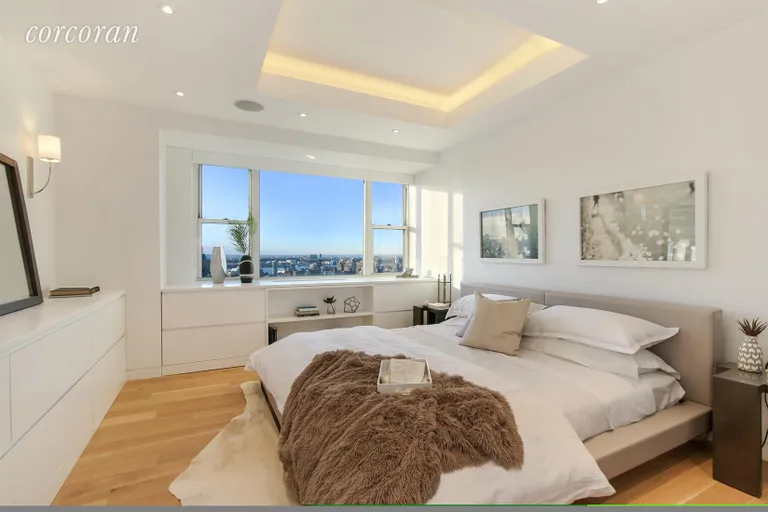 New York City Real Estate | View 60 East 8th Street, 33BC | Western-Facing Master Bedroom | View 5