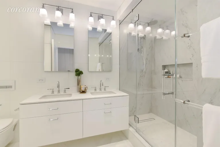 New York City Real Estate | View 60 East 8th Street, 33BC | Spa-Like Master Bath | View 6