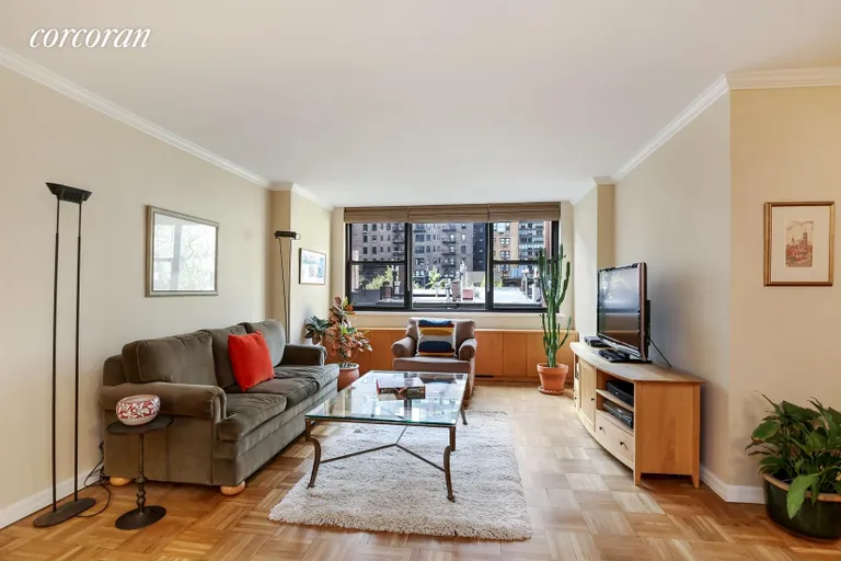 New York City Real Estate | View 420 East 51st Street, 5D | Living Room overlooking Charming Townhouse gardens | View 2
