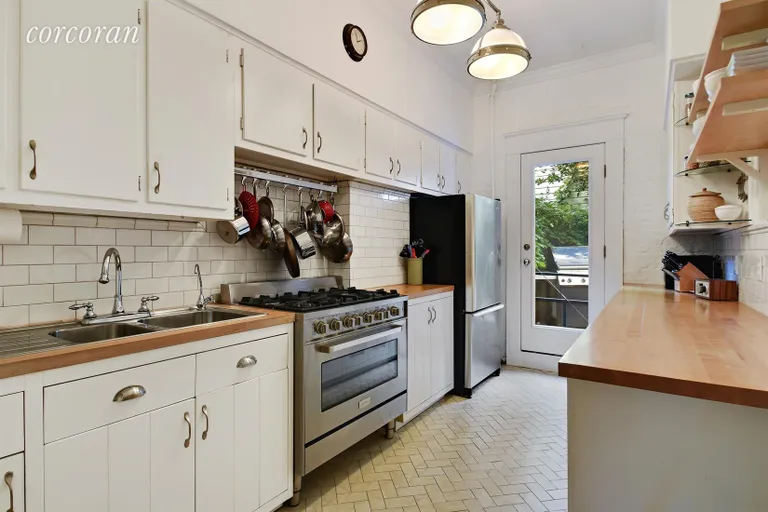 New York City Real Estate | View 323 Vanderbilt Street | Updated kitchen with new 5 burner range | View 4