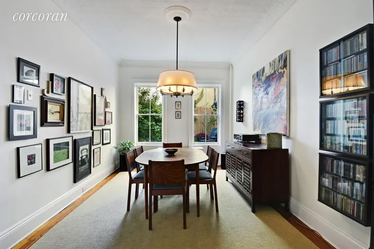 New York City Real Estate | View 323 Vanderbilt Street | Formal dining room with back garden views | View 3