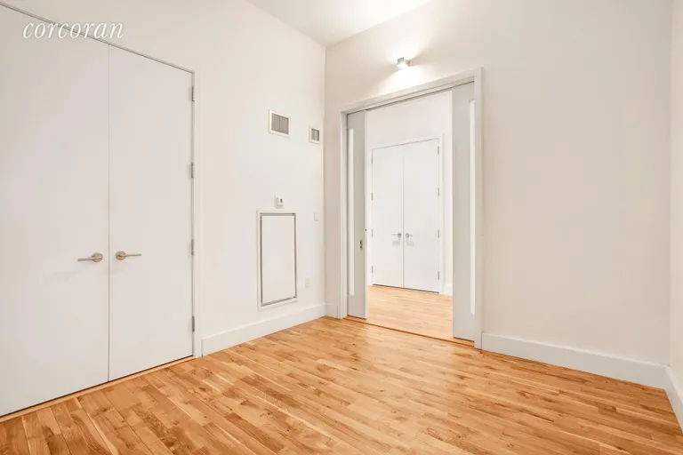 New York City Real Estate | View 360 Furman Street, 911 | Master Bedroom W/ Large Closet and Pocket Doors. | View 8