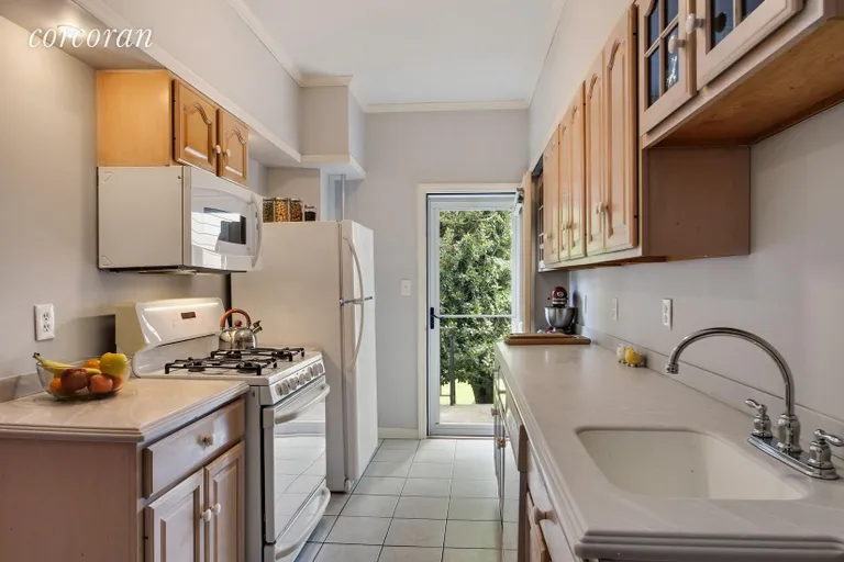 New York City Real Estate | View 110 Vanderbilt Street | Bright kitchen leading to your backyard | View 3