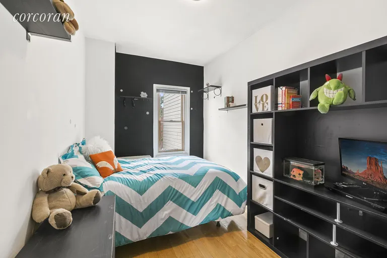 New York City Real Estate | View 110 Vanderbilt Street | Cheerful and bright bedroom with a double bed | View 5