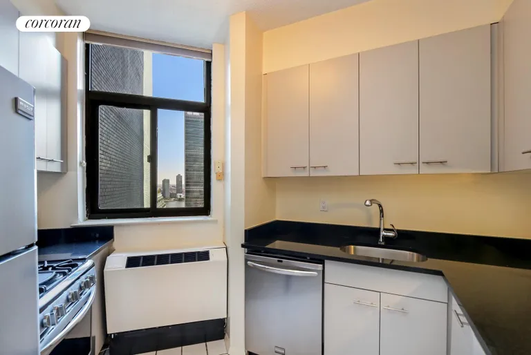 New York City Real Estate | View 303 East 43rd Street, 20C | Open Kitchen with East River Views | View 2