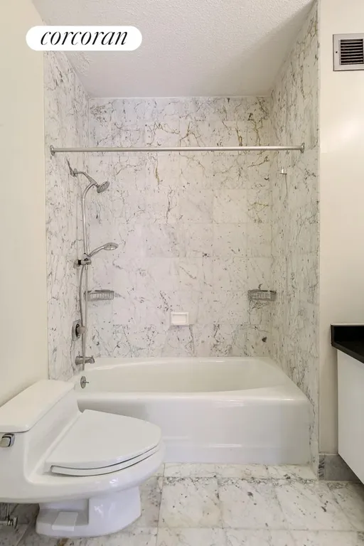 New York City Real Estate | View 303 East 43rd Street, 20C | Marble Bath  | View 4