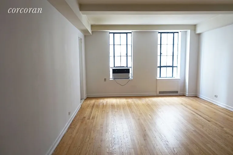 New York City Real Estate | View 353 West 56th Street, 7L | Garden Facing Living Room | View 3