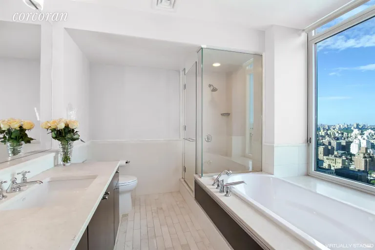 New York City Real Estate | View 207 East 57th Street, 34A | Master Bathroom with Picture Window Views | View 5