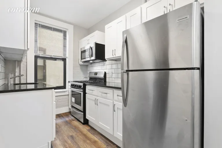 New York City Real Estate | View 817 8th Avenue, 4F | Sleek and chic kitchen  | View 3