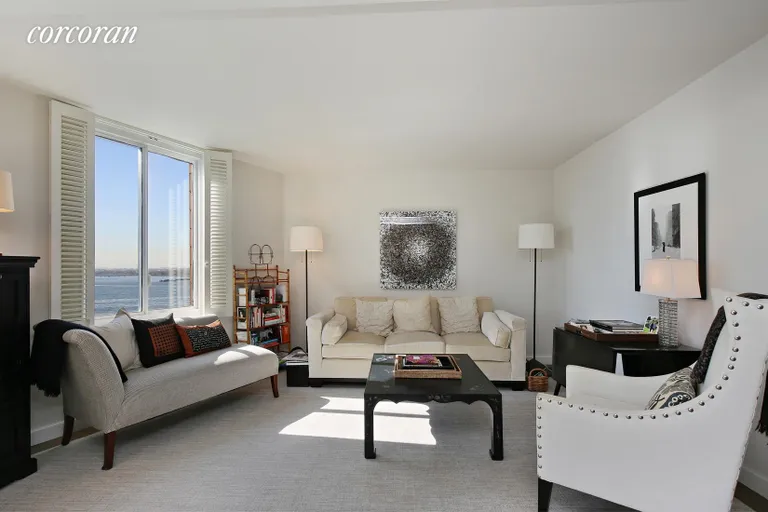 New York City Real Estate | View 333 Rector Place, PH6S | Living Room with River Views | View 2