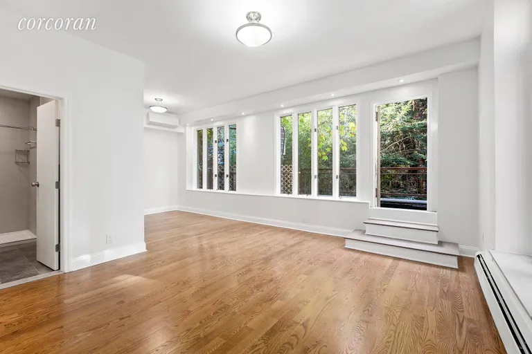 New York City Real Estate | View 212 West 15th Street, 2 | Master bedroom with private terrace | View 4