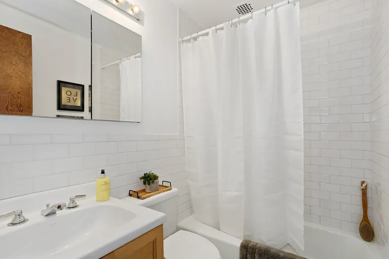 New York City Real Estate | View 150 Joralemon Street, 11B | Renovated Bath with Subway Tiles | View 6