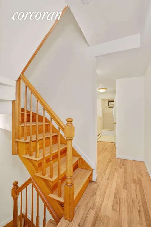 New York City Real Estate | View 104 Clifton Place, A1 | Stairs leading up to  upper bedroom and down. | View 4