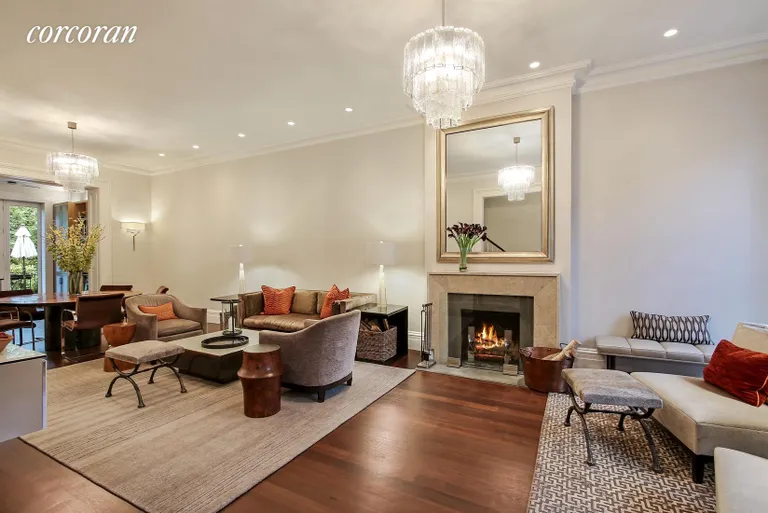 New York City Real Estate | View 31 Tompkins Place | Parlor floor with wood burning fireplace | View 2