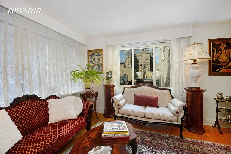 New York City Real Estate | View 30 East 65th Street, 9D | Living Room with Open City Views | View 2
