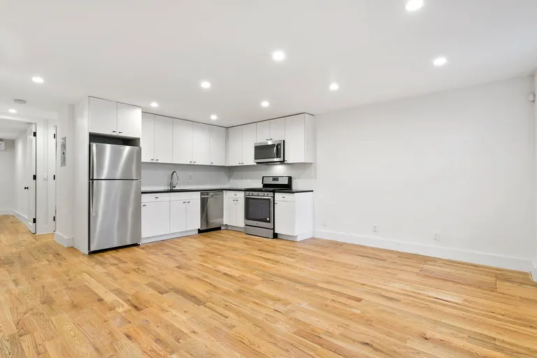 New York City Real Estate | View 1066 Lafayette Avenue | Garden Apartment Living & Kitchen | View 10