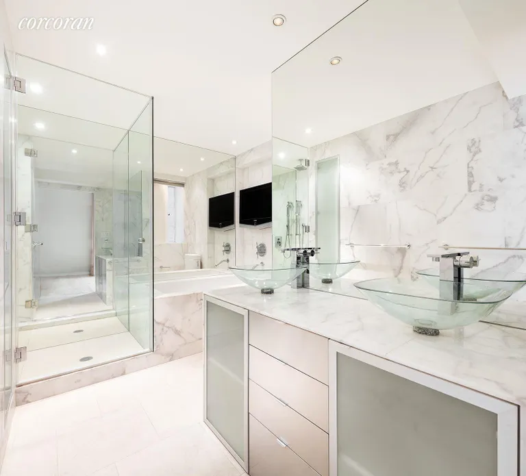 New York City Real Estate | View 230 Central Park South, 2DE | Marble Master Bathroom with Deep Soaking Tub | View 4