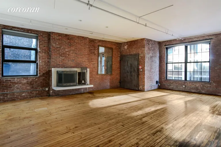 New York City Real Estate | View 554 Broome Street, 5 FL | Living Room | View 2