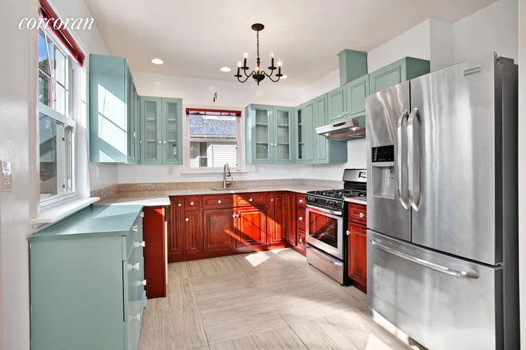 New York City Real Estate | View 8424 110th Street, 2 | Kitchen With Two Windows | View 3