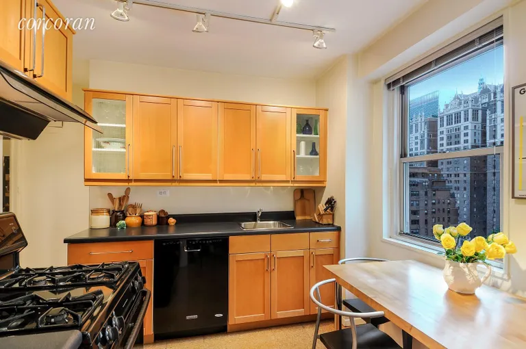 New York City Real Estate | View 300 East 40th Street, 18J | Windowed eat-in kitchen with gas stove | View 4
