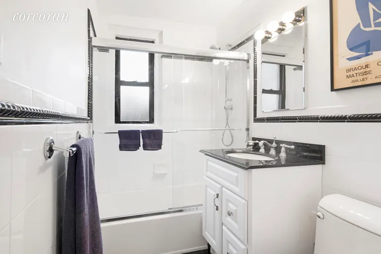 New York City Real Estate | View 319 East 50th Street, 7F | Renovated Bathroom with Window | View 4
