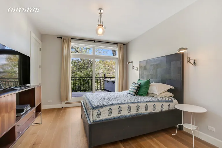 New York City Real Estate | View 331 De Graw Street | Master Bedroom with Tree Line Views | View 5