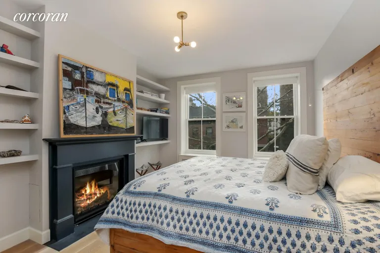 New York City Real Estate | View 331 De Graw Street | Den or Guest Bedroom with Gas Fireplace | View 9