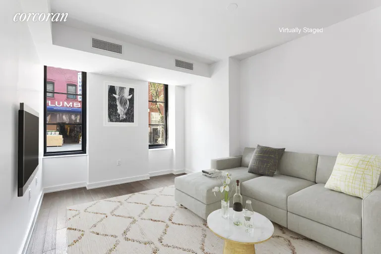 New York City Real Estate | View 261 West 25th Street, 1C | Living Room | View 2