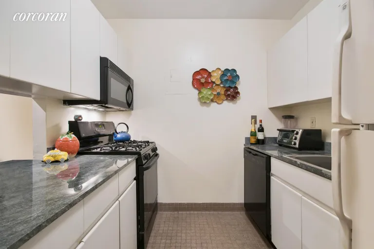 New York City Real Estate | View 420 East 58th Street, 3C | Pass-thru Kitchen | View 4