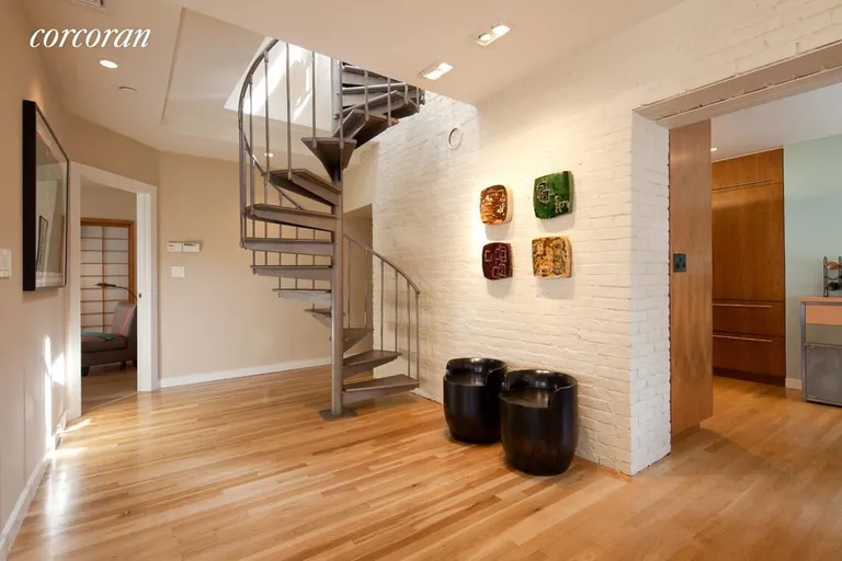 New York City Real Estate | View 90 Hudson Street, 7A | Spiral Staircase leading to finsihed bulkhead | View 4