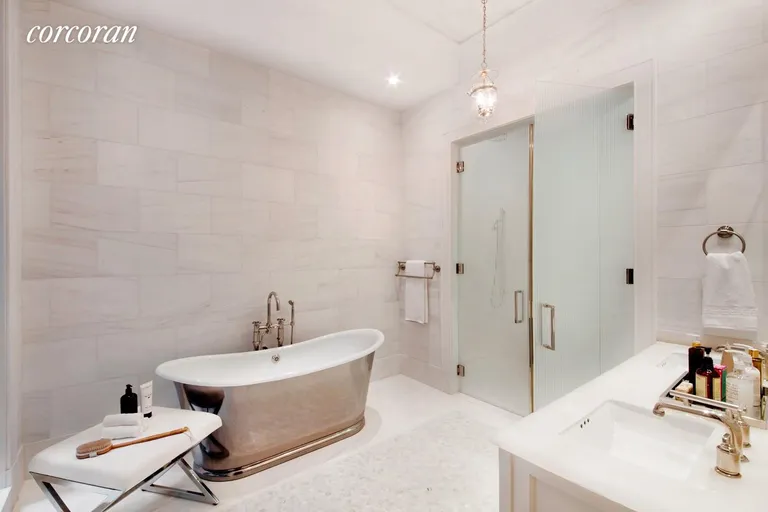 New York City Real Estate | View 1110 Park Avenue, C | Luxurious Bianco Dolomiti Marble Clad Master Bath | View 6