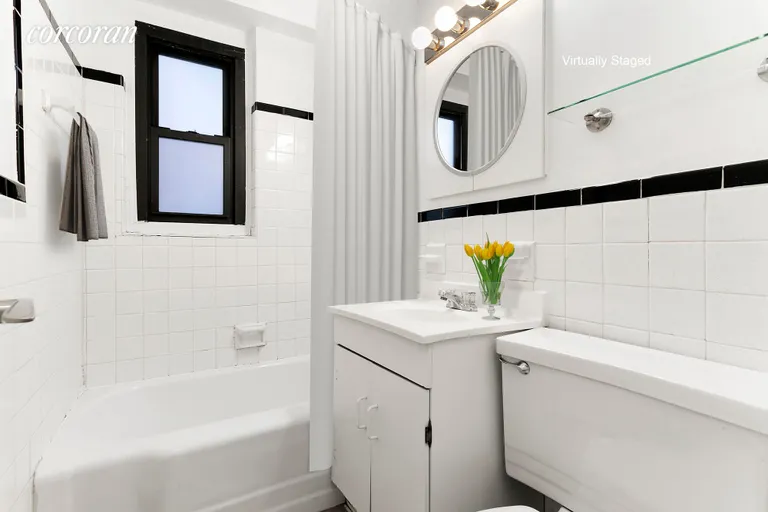 New York City Real Estate | View 210 East 15th Street, 5L | Windowed bathroom with tub/shower | View 5