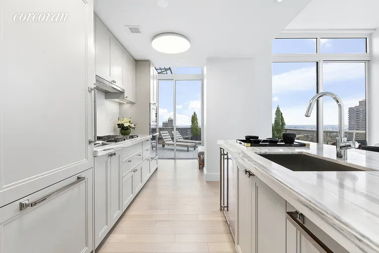 New York City Real Estate | View 389 East 89th Street, PH1 | Open Kitchen with Miele appliances | View 4