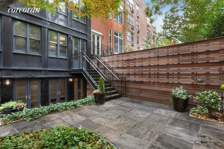 New York City Real Estate | View 327-329 West 22nd Street, 1 | Private Garden Oasis | View 3