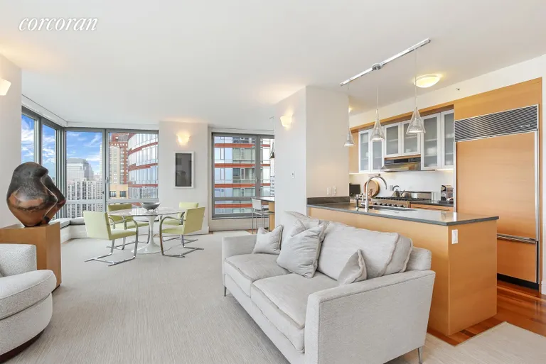 New York City Real Estate | View 30 West Street, 30A | Open Chef's Kitchen with Breakfast Bar | View 2