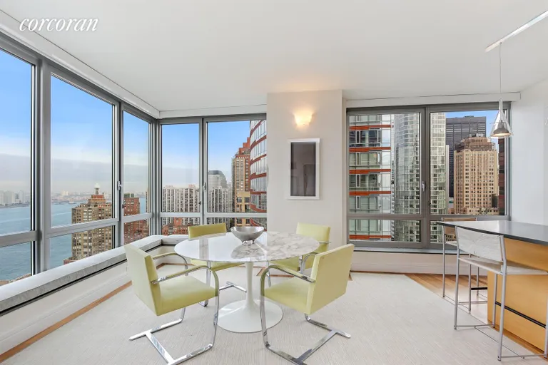 New York City Real Estate | View 30 West Street, 30A | Dining Room with River Views | View 3