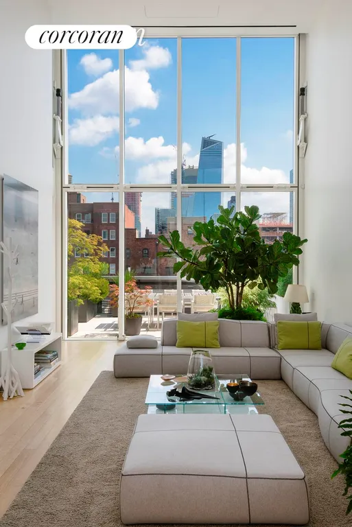 New York City Real Estate | View 524 West 19th Street, PH | Living Room with 20' ceilings | View 3