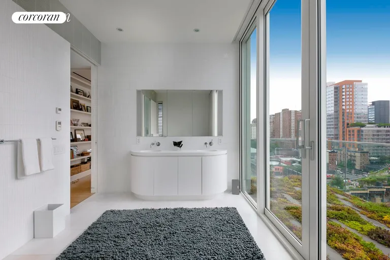 New York City Real Estate | View 524 West 19th Street, PH | Master Bathroom with views south onto terrace | View 10