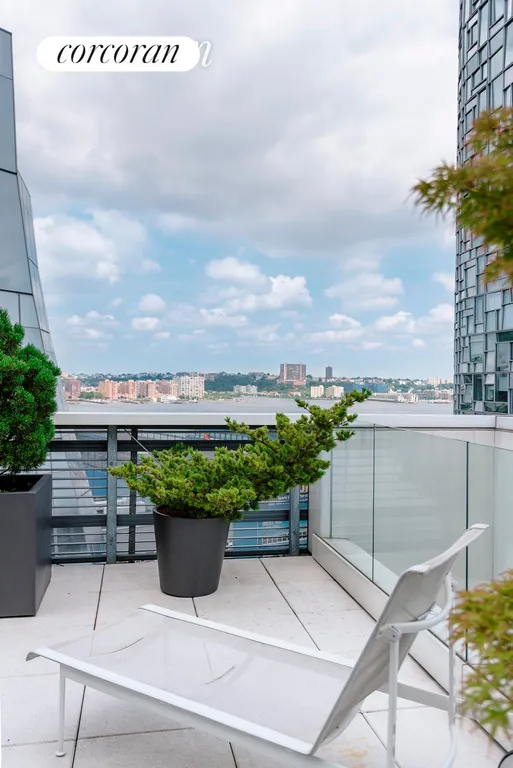 New York City Real Estate | View 524 West 19th Street, PH | Rooftop Terrace with Hudson River Views West | View 12