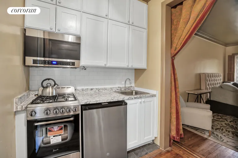 New York City Real Estate | View 231 East 54th Street, 4D | Renovated kitchen with stainless steel appliances | View 4