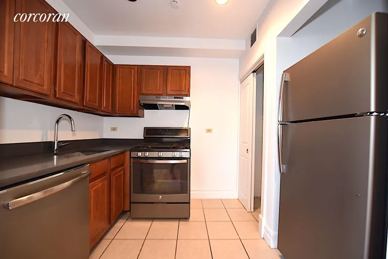 New York City Real Estate | View 45-02 Ditmars Boulevard, 102 | room 1 | View 2