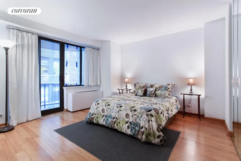 New York City Real Estate | View 45 East 25th Street, 18D | Large bedroom, great closet space, private balc | View 3
