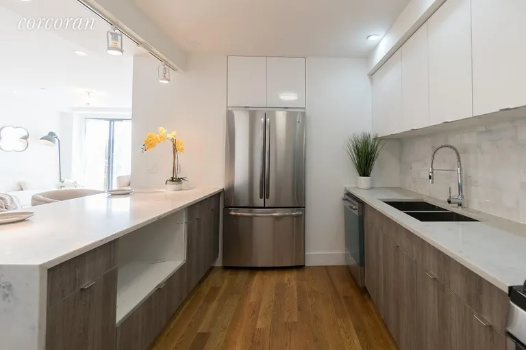 New York City Real Estate | View 781 East 9th Street, 2A | Marble Backsplash cascading countertop | View 2
