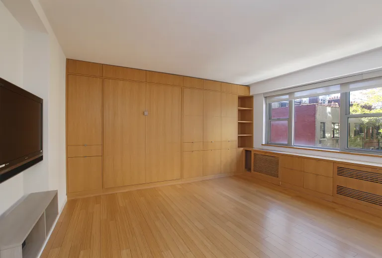 New York City Real Estate | View 100 West 93rd Street, 5D | Custom-designed built-in cabinetry and murphy bed | View 2