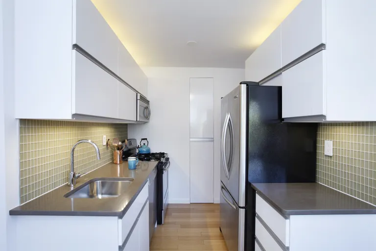 New York City Real Estate | View 100 West 93rd Street, 5D | Chef's kitchen with full-size stainless appliances | View 3