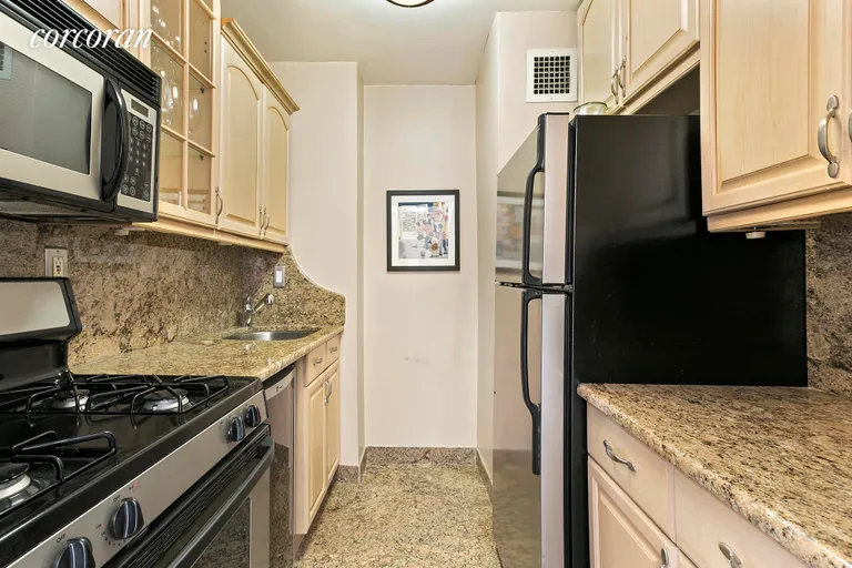New York City Real Estate | View 301 East 79th Street, 25L | Renovated Kitchen  | View 3
