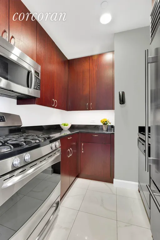 New York City Real Estate | View 1 Central Park West, 1706 | Fully-equipped kitchen with Sub-Zero refrigerator | View 7